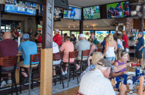 Guests watching football